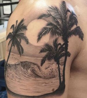 tatuaje de palmeras y el mar