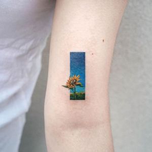 tatuaje pequeño girasol
